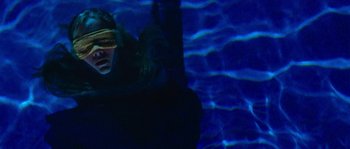 Movie still from “LarzRanda - Lifeguard” (2015), directed by Thunderlips – Medium shot, Overhead angle