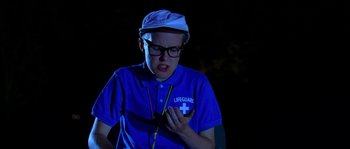 Movie still from “LarzRanda - Lifeguard” (2015), directed by Thunderlips – Medium shot, High angle