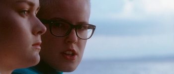 Movie still from “LarzRanda - Lifeguard” (2015), directed by Thunderlips – Close Up shot, Low angle
