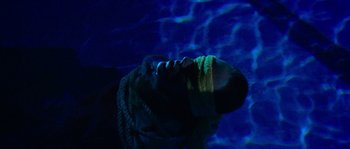 Movie still from “LarzRanda - Lifeguard” (2015), directed by Thunderlips – Extreme Close Up shot, Overhead angle