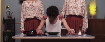 Movie still from “Gilligan Moss - Choreograph” (2015), directed by Oscar Hudson – Medium shot, Overhead angle