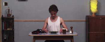Movie still from “Gilligan Moss - Choreograph” (2015), directed by Oscar Hudson – Medium shot, Overhead angle