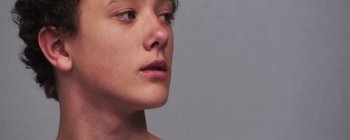 Movie still from “Gilligan Moss - Choreograph” (2015), directed by Oscar Hudson – Extreme Close Up shot, Low angle