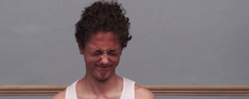 Movie still from “Gilligan Moss - Choreograph” (2015), directed by Oscar Hudson – Close Up shot, Over the shoulder angle