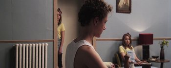 Movie still from “Gilligan Moss - Choreograph” (2015), directed by Oscar Hudson – Medium shot, Over the shoulder angle