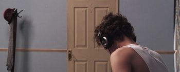 Movie still from “Gilligan Moss - Choreograph” (2015), directed by Oscar Hudson – Medium shot, Low angle