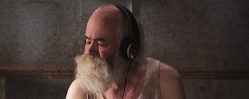 Movie still from “Gilligan Moss - Choreograph” (2015), directed by Oscar Hudson – Close Up shot, Low angle