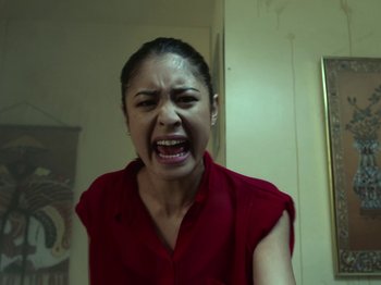 Movie still from “The Eversons - Emily” (2015), directed by Thunderlips – Close Up shot, Low angle