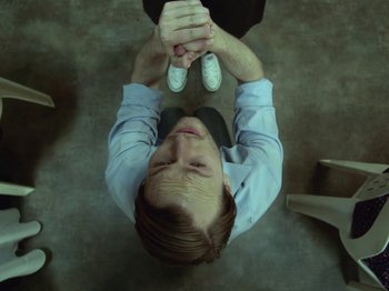 Movie still from “The Eversons - Emily” (2015), directed by Thunderlips – Medium shot, Overhead angle