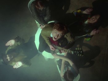 Movie still from “The Eversons - Emily” (2015), directed by Thunderlips – Wide shot, Overhead angle