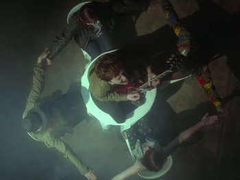 Movie still from “The Eversons - Emily” (2015), directed by Thunderlips – Wide shot, Overhead angle
