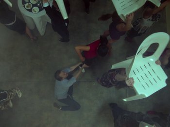 Movie still from “The Eversons - Emily” (2015), directed by Thunderlips – Wide shot, Overhead angle