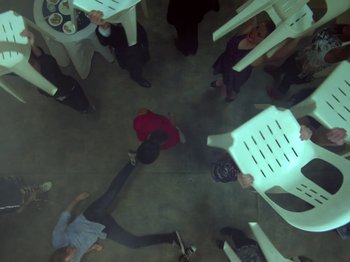 Movie still from “The Eversons - Emily” (2015), directed by Thunderlips – Extreme Wide shot, Overhead angle