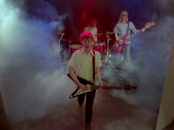 Movie still from “The Eversons - Emily” (2015), directed by Thunderlips – Wide shot, Low angle
