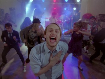 Movie still from “The Eversons - Emily” (2015), directed by Thunderlips – Wide shot, Low angle