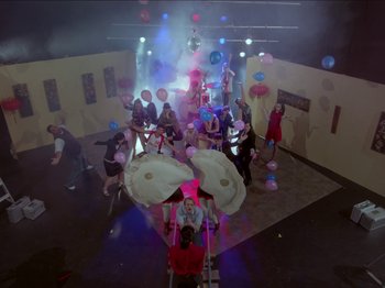 Movie still from “The Eversons - Emily” (2015), directed by Thunderlips – Extreme Wide shot, Overhead angle