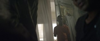 Movie still from “Flying Lotus - Coronus, The Terminator” (2015), directed by Young Replicant – Medium shot, Low angle