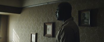 Movie still from “Flying Lotus - Coronus, The Terminator” (2015), directed by Young Replicant – Medium shot, Low angle