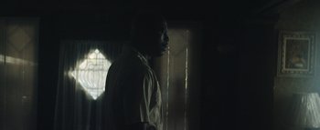 Movie still from “Flying Lotus - Coronus, The Terminator” (2015), directed by Young Replicant – Medium shot, Low angle