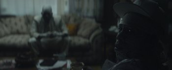 Movie still from “Flying Lotus - Coronus, The Terminator” (2015), directed by Young Replicant – Extreme Close Up shot, Over the shoulder angle