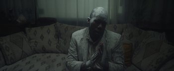 Movie still from “Flying Lotus - Coronus, The Terminator” (2015), directed by Young Replicant – Medium shot, High angle