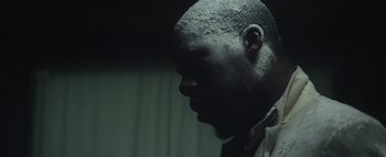 Movie still from “Flying Lotus - Coronus, The Terminator” (2015), directed by Young Replicant – Extreme Close Up shot, Low angle