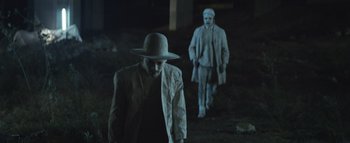 Movie still from “Flying Lotus - Coronus, The Terminator” (2015), directed by Young Replicant – Medium shot, Low angle