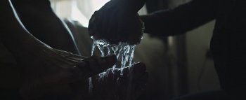 Movie still from “Flying Lotus - Coronus, The Terminator” (2015), directed by Young Replicant – Extreme Close Up shot, Low angle