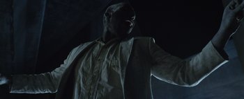 Movie still from “Flying Lotus - Coronus, The Terminator” (2015), directed by Young Replicant – Medium shot, Low angle