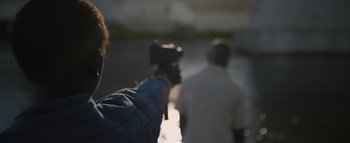 Movie still from “Flying Lotus - Coronus, The Terminator” (2015), directed by Young Replicant – Extreme Close Up shot, Over the shoulder angle