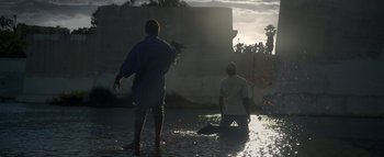 Movie still from “Flying Lotus - Coronus, The Terminator” (2015), directed by Young Replicant – Wide shot, Low angle