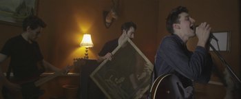 Movie still from “One Night Only - Plasticine” (2014), directed by Oscar Hudson – Medium shot, Over the shoulder angle