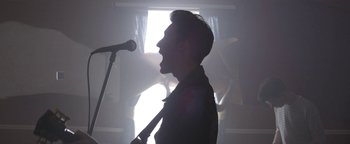 Movie still from “One Night Only - Plasticine” (2014), directed by Oscar Hudson – Medium shot, Low angle