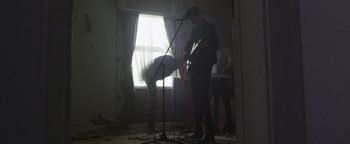 Movie still from “One Night Only - Plasticine” (2014), directed by Oscar Hudson – Wide shot, Low angle