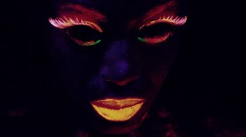 Movie still from “Major Lazer - Sweat” (2014), directed by Ryan Staake – Extreme Close Up shot, Overhead angle