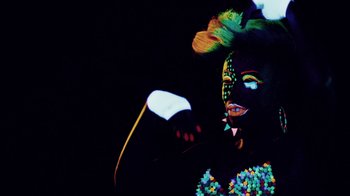 Movie still from “Major Lazer - Sweat” (2014), directed by Ryan Staake – Medium shot, Low angle