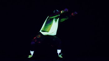 Movie still from “Major Lazer - Sweat” (2014), directed by Ryan Staake – Medium shot, Low angle