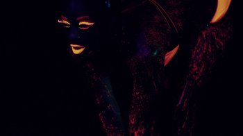 Movie still from “Major Lazer - Sweat” (2014), directed by Ryan Staake – Extreme Close Up shot, Low angle