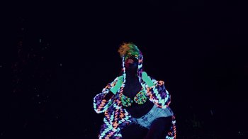 Movie still from “Major Lazer - Sweat” (2014), directed by Ryan Staake – Medium shot, Low angle