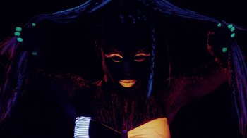 Movie still from “Major Lazer - Sweat” (2014), directed by Ryan Staake – Extreme Close Up shot, Low angle