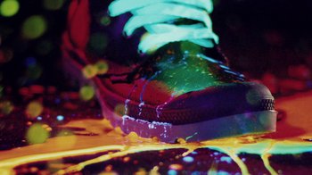 Movie still from “Major Lazer - Sweat” (2014), directed by Ryan Staake – Extreme Close Up shot, Overhead angle