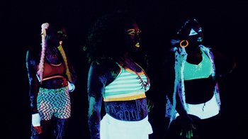 Movie still from “Major Lazer - Sweat” (2014), directed by Ryan Staake – Medium shot, Low angle