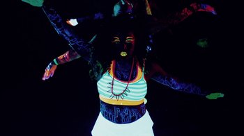 Movie still from “Major Lazer - Sweat” (2014), directed by Ryan Staake – Medium shot, Low angle