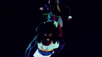 Movie still from “Major Lazer - Sweat” (2014), directed by Ryan Staake – Medium shot, Overhead angle