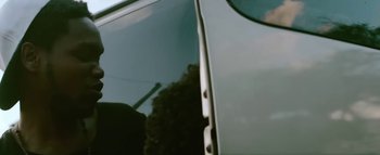 Movie still from “Little Dragon - Pretty Girls” (2014), directed by Nabil Elderkin – Close Up shot, Low angle