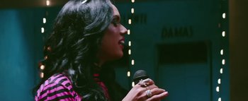 Movie still from “Little Dragon - Pretty Girls” (2014), directed by Nabil Elderkin – Close Up shot, Over the shoulder angle