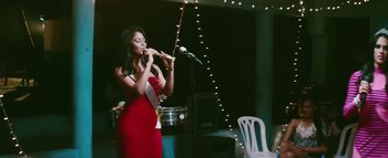 Movie still from “Little Dragon - Pretty Girls” (2014), directed by Nabil Elderkin – Medium shot, Low angle