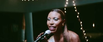 Movie still from “Little Dragon - Pretty Girls” (2014), directed by Nabil Elderkin – Close Up shot, Low angle