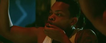 Movie still from “Little Dragon - Pretty Girls” (2014), directed by Nabil Elderkin – Close Up shot, Low angle