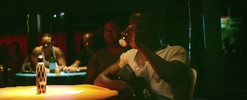 Movie still from “Little Dragon - Pretty Girls” (2014), directed by Nabil Elderkin – Medium shot, Over the shoulder angle